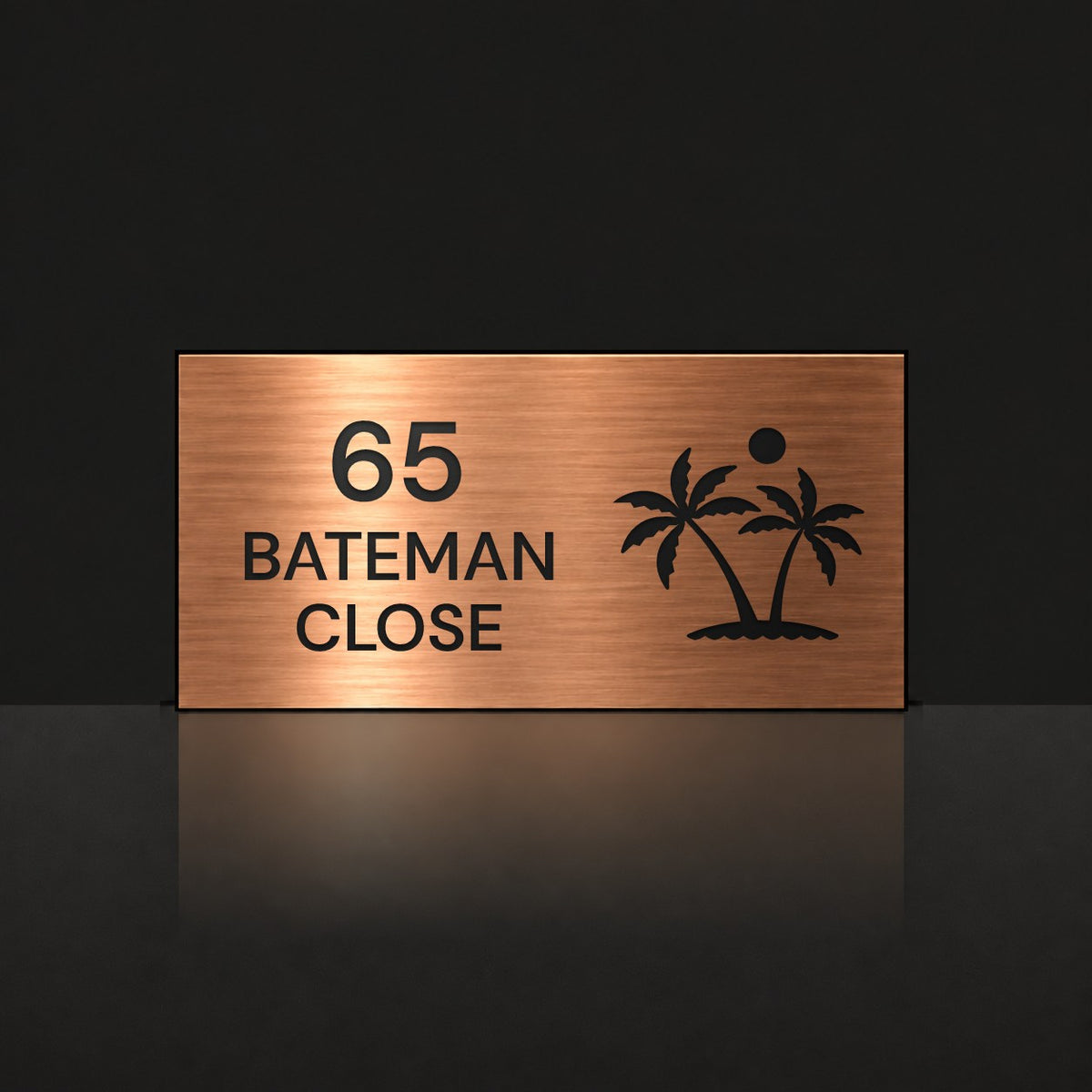 Brushed copper house number and street name sign with a brushed metal look, The Yaroomba, reading 65 Bateman Close in black lettering, with palm trees and a sun.