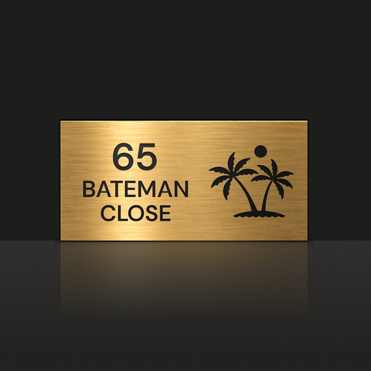 Brushed gold house number and street name sign with a brushed metal look, The Yaroomba, reading 65 Bateman Close in black lettering, with palm trees and a sun.