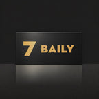 Brushed gold house number and street name sign with a brushed metal look, The Maleny, black face reading 7 Baily in gold lettering.