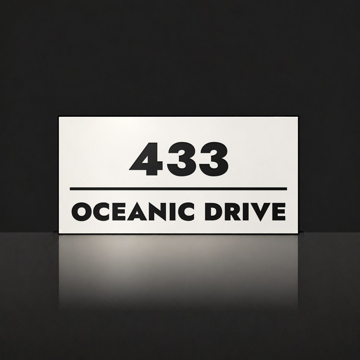 Matte white house number and street name sign, The Noosa, reading 433 Oceanic Drive in black lettering.
