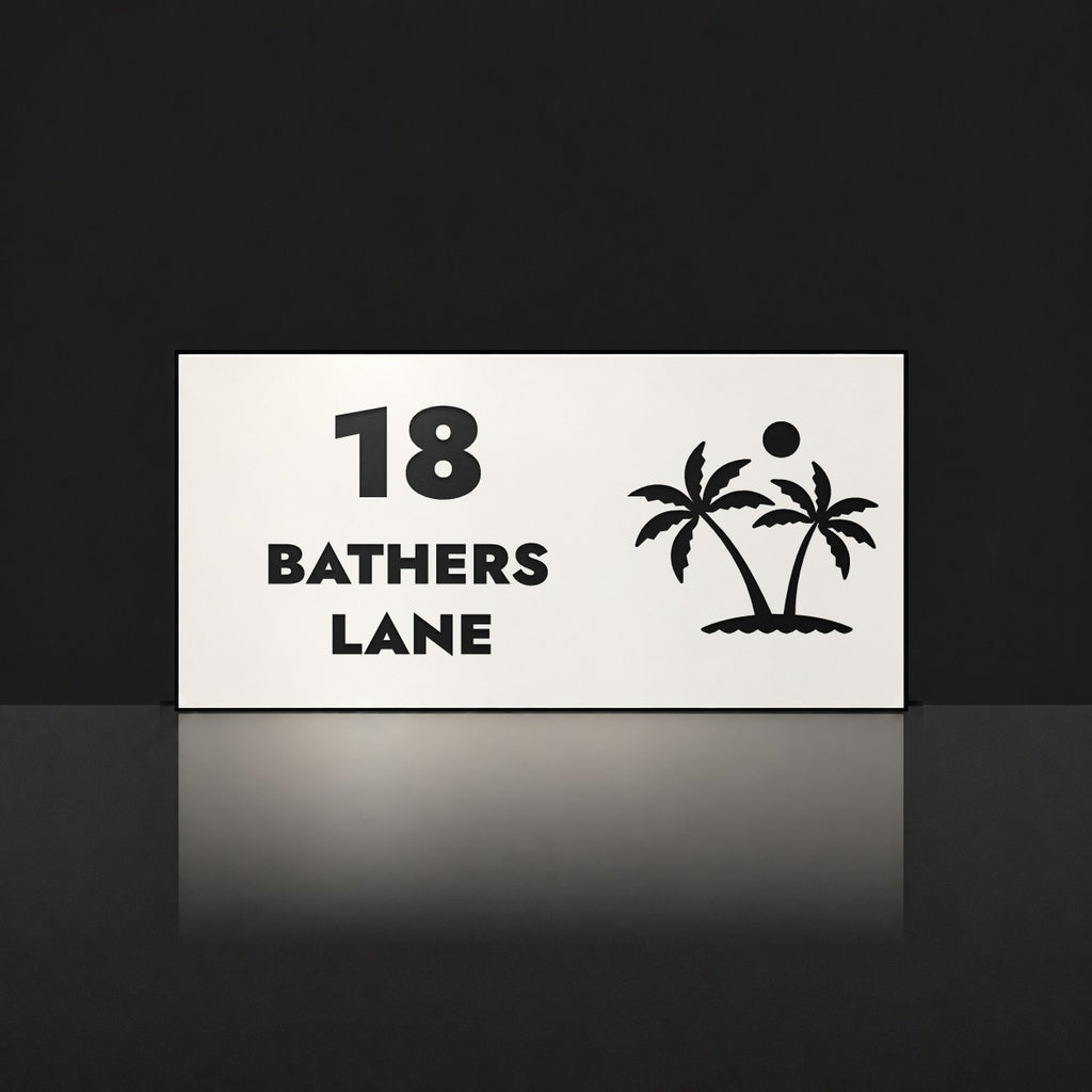 Matte white house number and street name sign, The Yaroomba, reading 18 Bathers Lane in black lettering, with palm trees and a sun.