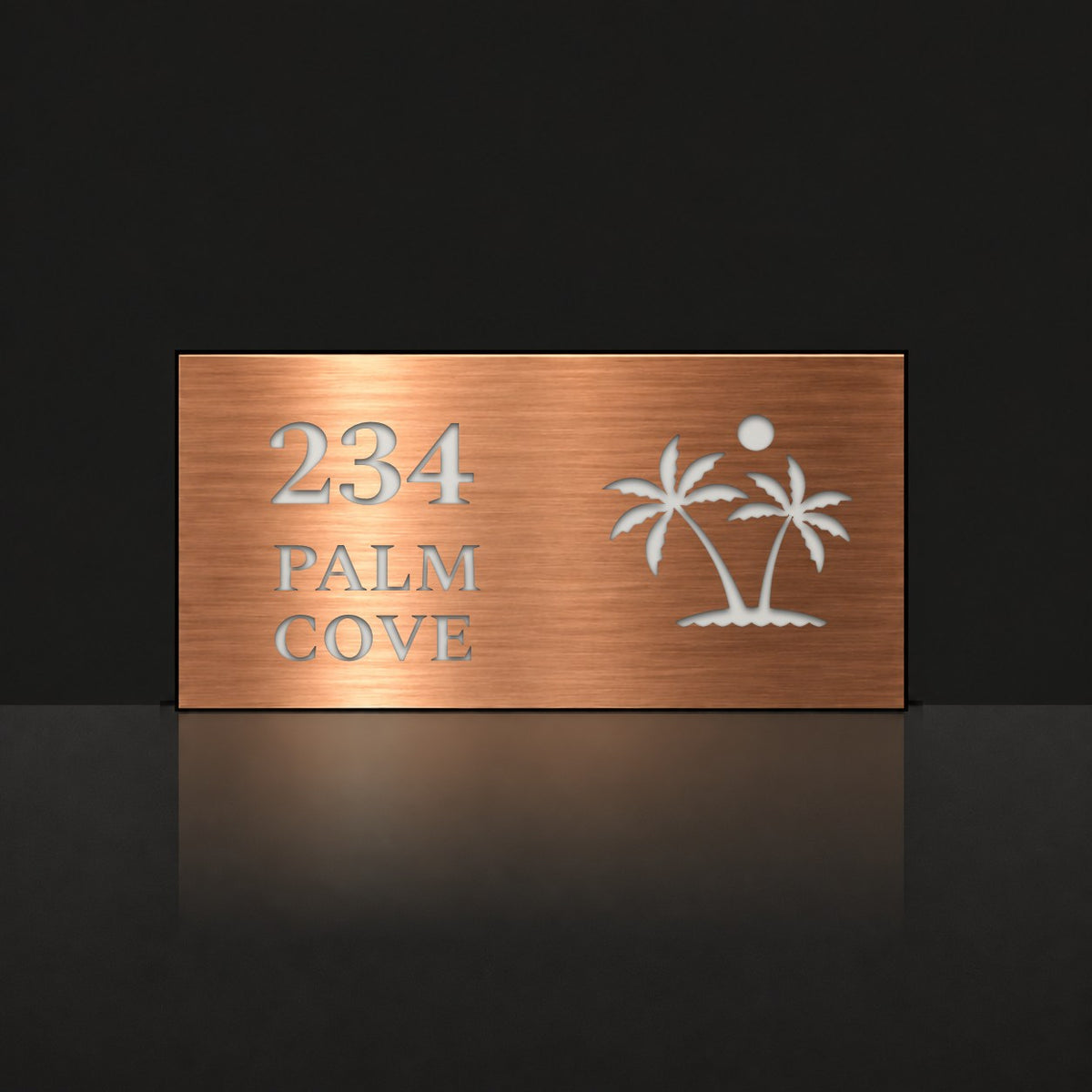 Brushed copper house number and street name sign with a brushed metal look, The Yaroomba, reading 234 Palm Cove in white lettering, with palm trees and a sun.