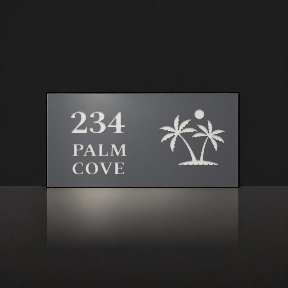Matte charcoal house number and street name sign, The Yaroomba, reading 234 Palm Cove in white lettering, with palm trees and a sun.