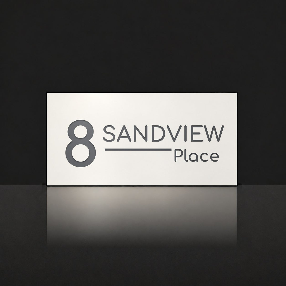 Matte white house number and street name sign, The Alexandra, reading 8 Sandview Place in charcoal lettering.