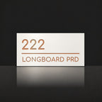 Brushed copper house number and street name sign with a brushed metal look, The Noosa, white face reading 222 Longboard Prd in copper lettering.