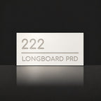 Brushed silver house number and street name sign with a brushed metal look, The Noosa, white face reading 222 Longboard Prd in silver lettering.