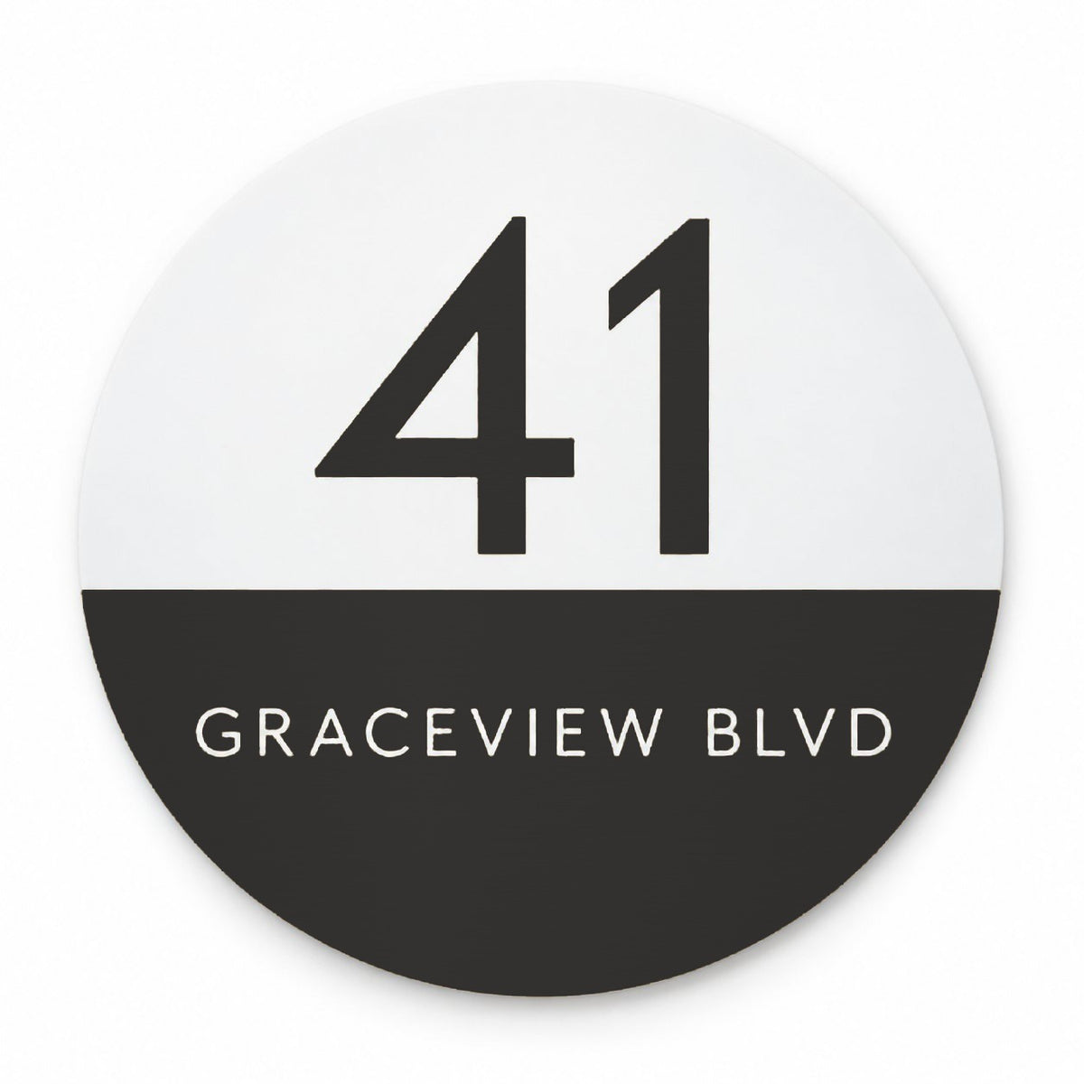 Matte round house number and street name sign reading 41 Graceview Blvd, white top half with a black number over a black bottom half with a white street name, The Buddina style.