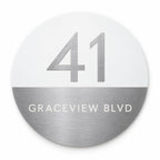 Silver round house number and street name sign reading 41 Graceview Blvd, white top half with a brushed silver number over a brushed silver bottom half with a white street name, The Buddina style.