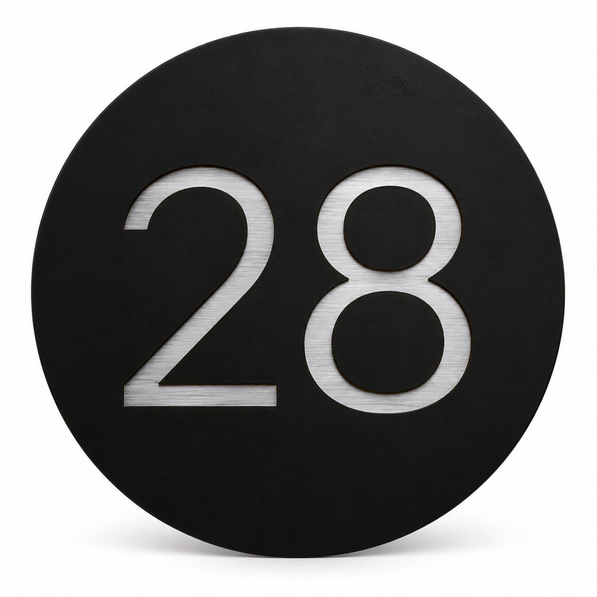 Black round house number sign with the number 28 in brushed silver, The Caloundra style, on a plain white background.