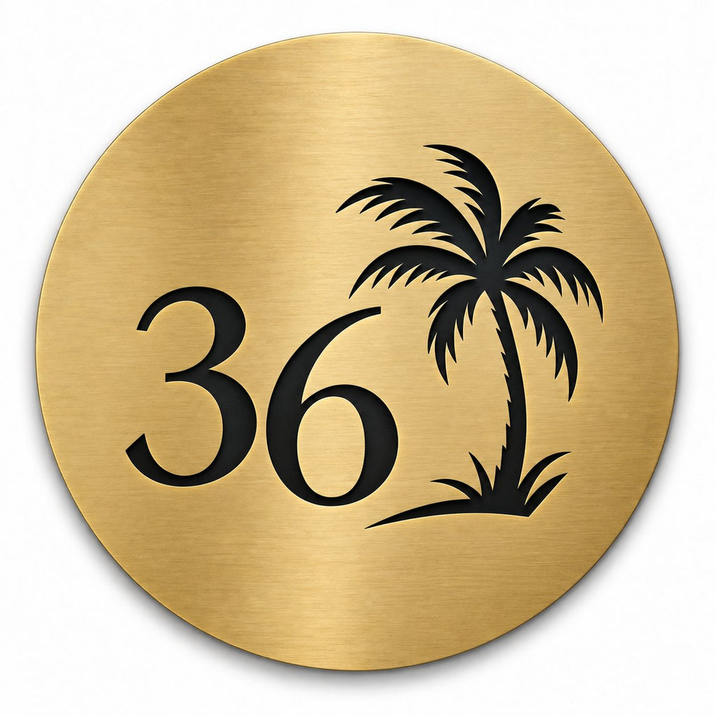 Brushed gold round house number sign with the number 36 and a palm tree cut through to black, The Mooloolaba style, on a plain white background.